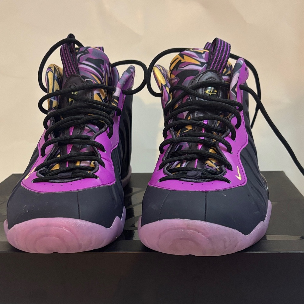 Purple and Black Nike Little POSITE ONE (GS). Size 7 youth . Fits a woman 8-1/2.